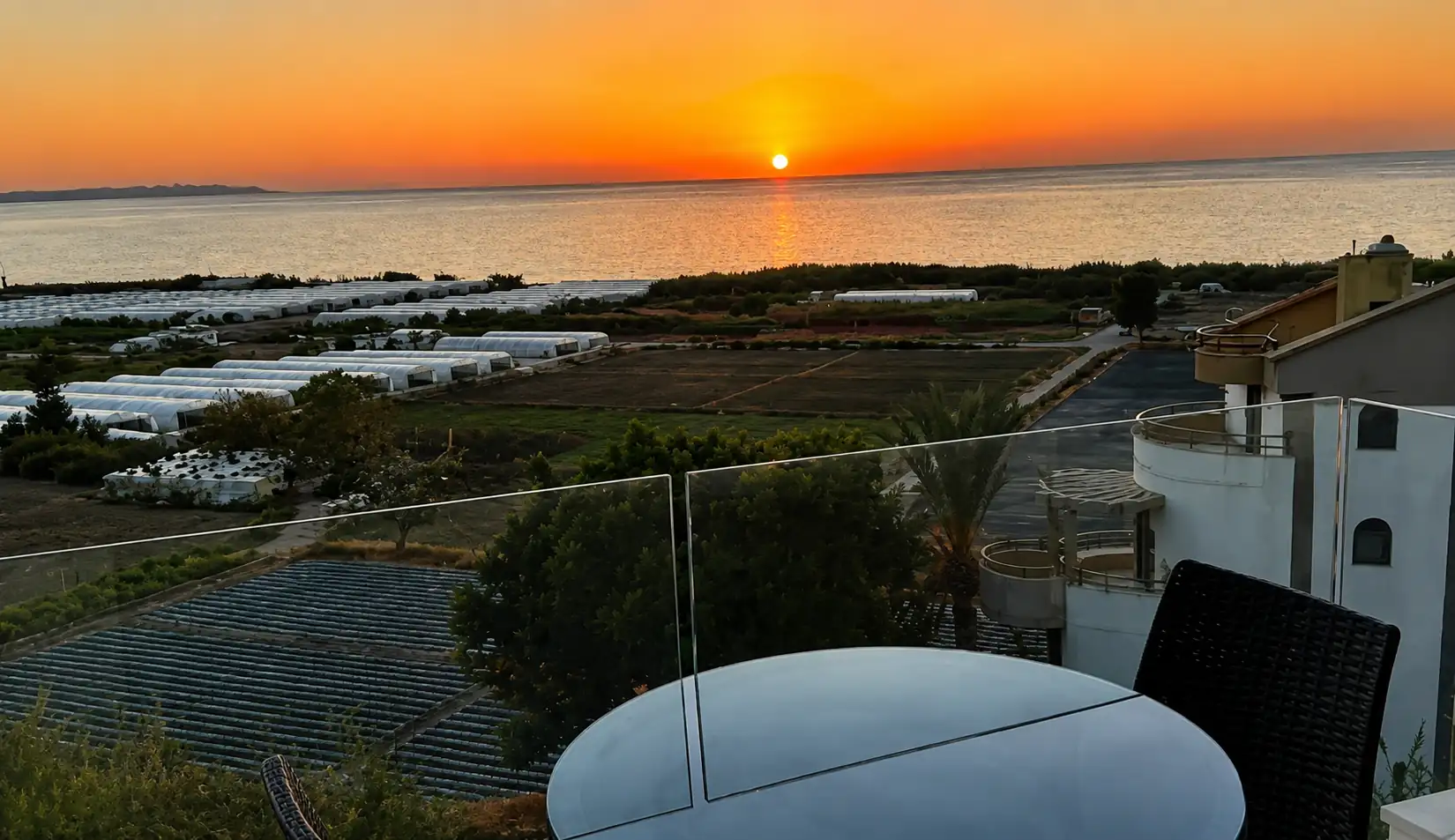 Sunset sea view from a hotel balcony